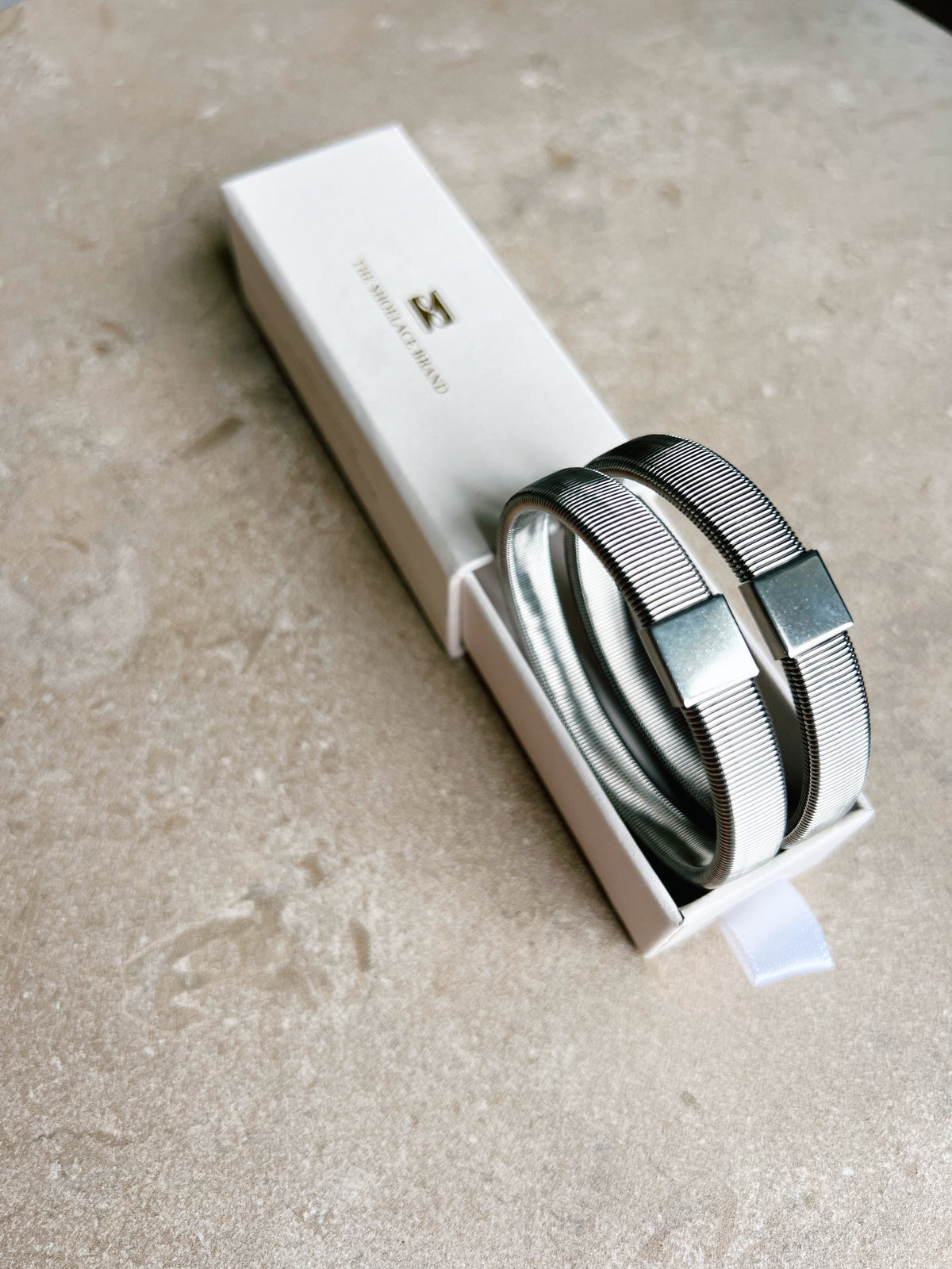 Shirt Sleeve Holder Silver The Shoelace Brand